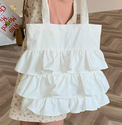 フリル肩掛け、優雅なキャンバスバッグ