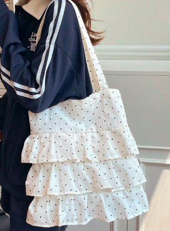 フリル肩掛け、優雅なキャンバスバッグ